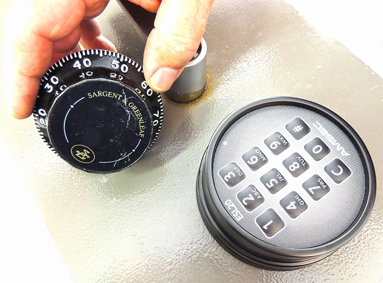 Dial lock next to an electronic lock